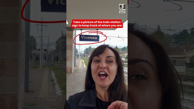 Take a picture of the train station sign to keep track of where you are